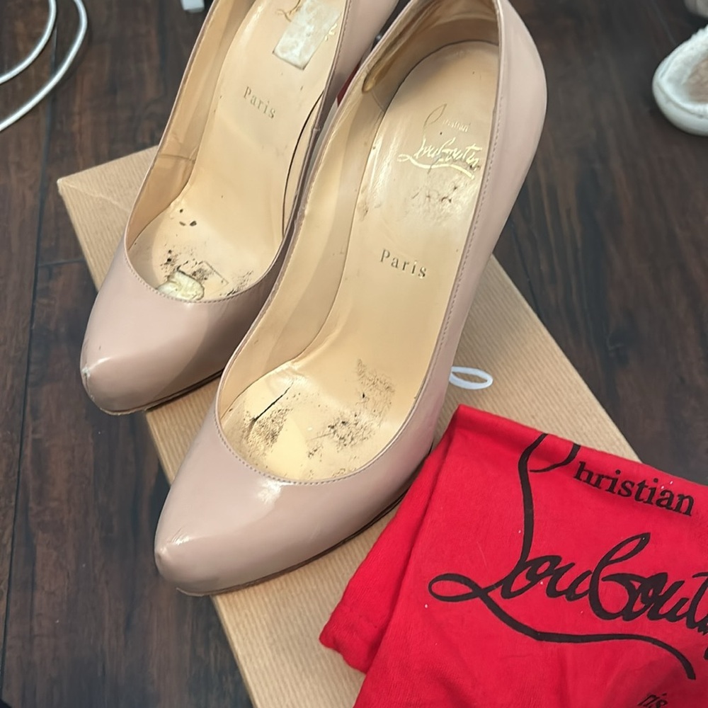 Christian Louboutins tan heels